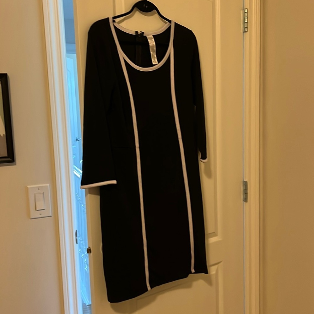 Fitted black dress.  Avon. XL
